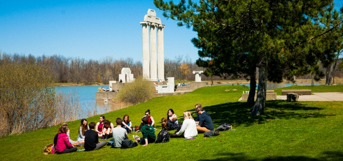 Students sitting in a circle near Baird Point. 