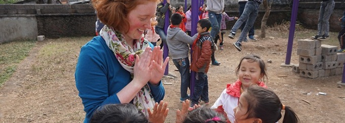 Woman interacting with children in china. 