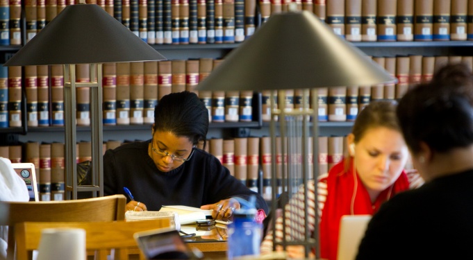 Student in UB Law Library. 