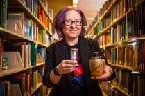 Cari Casteel, with the Department of History, poses for a portrait in the Lockwood Library. 