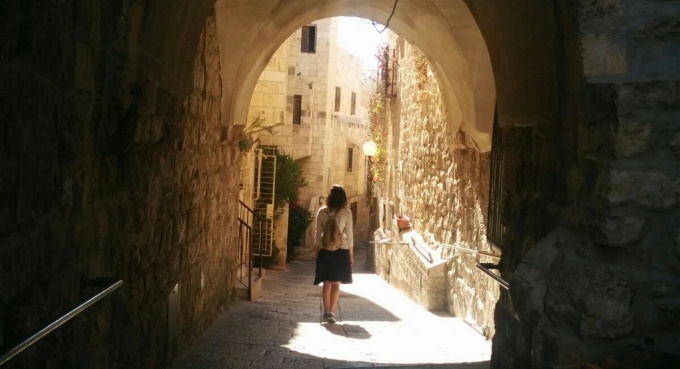 A student walking in the Old City in Jerusalem. 