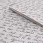 A handwritten page in a journal. 