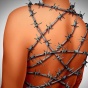Concept of chronic pain: a human torso wrapped with barbed wire. 