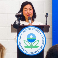 Eun-Hye Enki Yoo, PhD, associate professor in the UB Department of Geography speaks during a press conference announcing air monitor installations in East Side neighborhoods as part of an EPA grant. 