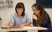 Two students working on an assignment. 