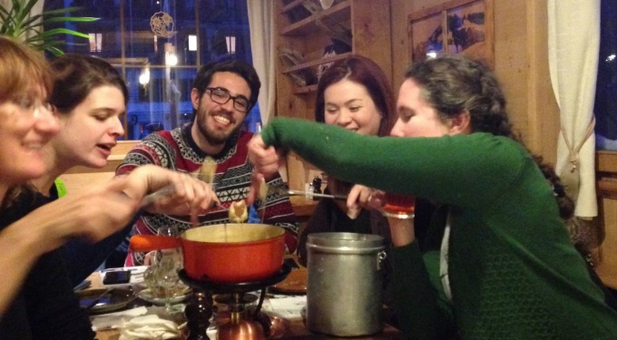 Students eating fondue in Lausanne, Switzerland. 