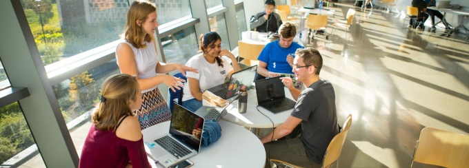 Student studying in groups in the Davis Hall atrium on North Campus. Photographer: Douglas Levere. 