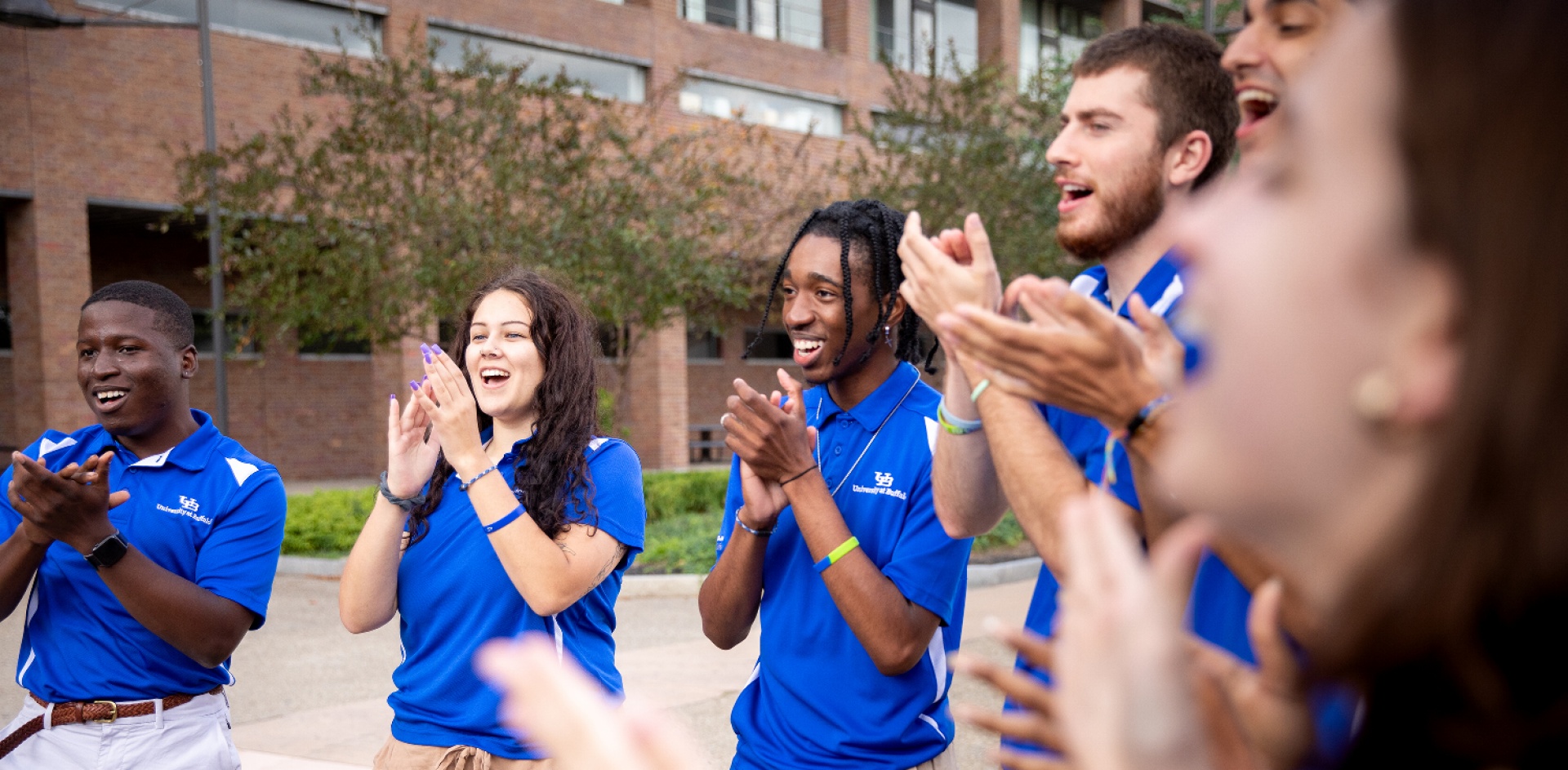 Orientation Leaders, with Orientation, Transition and Parent Programs, part of Student Life, gather for a group spirit display on the Spine on North Campus.