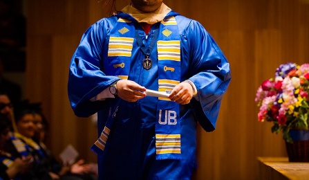 graduate in commencement ceremony. 