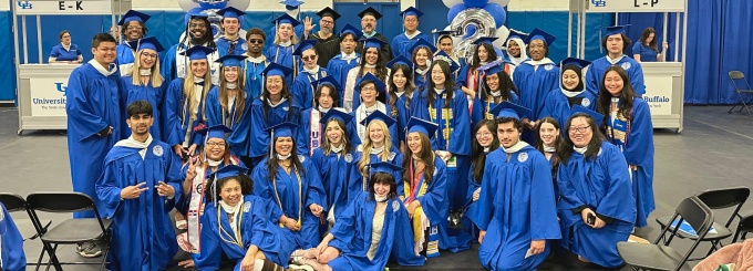 Zoom image: College of Arts and Sciences 2025 undergraduate commencement, students receiving degrees from the Department of Art. 