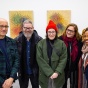 Zoom image: John Opera enjoys a visit from some UB colleagues during the opening reception. From left: Opera, Matt Kenyon, Becky Brown, Laura Chiesa and Victoria Udondian. 