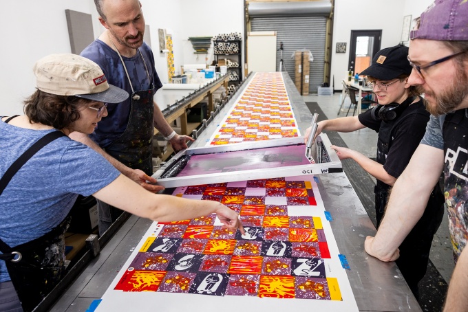 Zoom image: Gardner Astalos (rear right), at Red Disk studio, with Professor Breuer (rear left) and Red Disk staff. Photo: Meredith Forrest Kulwicki 