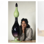 Zoom image: From left: Black Star Line (2024), blown glass created with the Museum of Glass; Crystal Z Campbell pictured with one of her blown glass works; and The Comet (after W.E.B. Du Bois) (2024). Glass works photographed by Ian Lewis; headshot by Brandon Watson. 