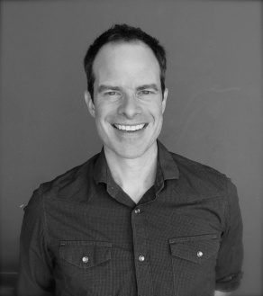 Zoom image: black and white headshot of Matt Isaac