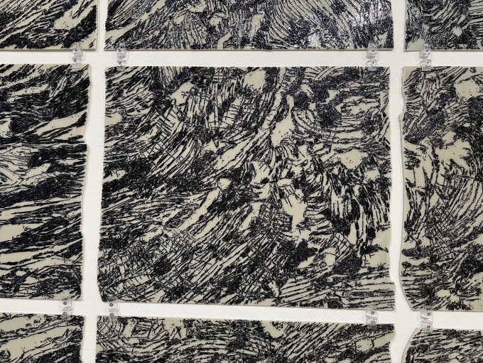 art panels made on glass rectangles with wave patterns. 