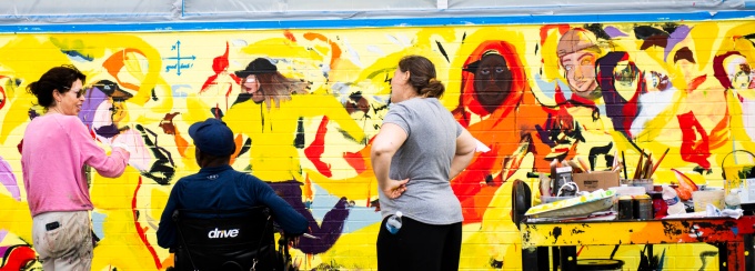 Zoom image: Artists Cecily Brown. George Hughes and Sara Zak working together on mural at Buffalo Academy of Visual and Performing Arts. 