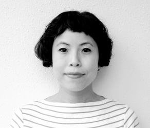 Black and white headshot of artist Lili Chen wearing a striped shirt.
