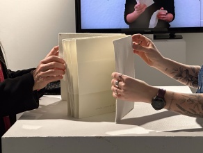 Zoom image: During the participatory performance with Artist K MacNeil, at the reception on Wednesday, 2/21/24, 5-7PM. 