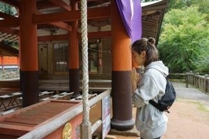 Student Carmila Stafford in front of a building in Japan. 