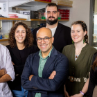 The lab of Omer Gokcumen (front center) co-led the study and helped analyze the genomes of 68 ancient humans for answers about our ability to begin breaking down starch in the mouth. Photo: Meredith Forrest Kulwicki. 