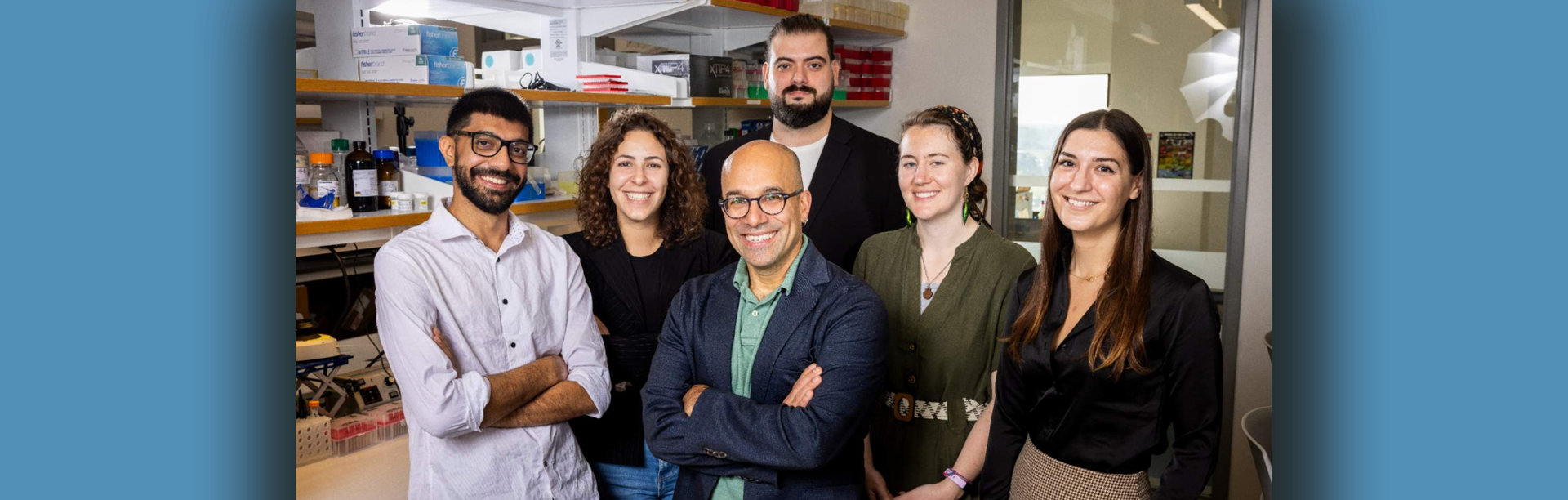 The lab of Omer Gokcumen (front center) co-led the study and helped analyze the genomes of 68 ancient humans for answers about our ability to begin breaking down starch in the mouth. Photo: Meredith Forrest Kulwicki. 