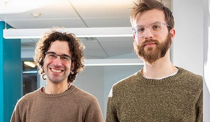 Pictured, fom left: Vincent Lynch, associate professor of biological sciences, and postdoctoral researcher Jacob Bowman. Photo: Douglas Levere. 
