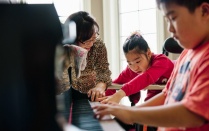 Expressing interest: Biologist Soo-Kyung Lee with her daughter Yuna and her son Joon. Yuna cannot walk or speak, but she likes stuffed animals and toys that light up or play music. Photograph by Eric Tronolone. 