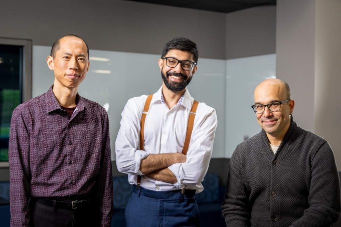 A portrait of (from left) Naoki Masuda, with the department of mathematics, Alber Aquil, and Omer Gokcumen, both with the department of biological sciences. The group recently worked on a paper and were photographed in May 2025 in the Natural Sciences Complex. \r\rPhotographer: Meredith Forrest Kulwicki. 