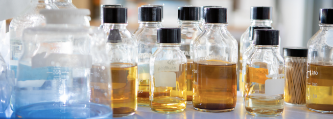 A detailed image of some bottles in the research lab. 