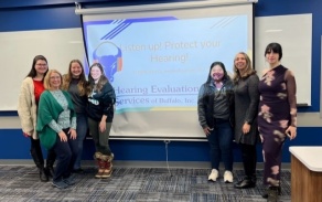 SAA students and Dr. Stecker with Dr. Baumann. 