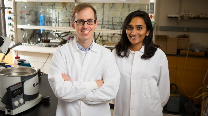 Prof. Timothy Cook and student in the lab. 