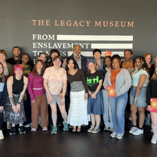 Group of students and faculty outside the Legacy Museum store. 