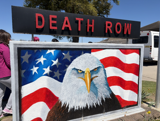 Painting of an eagle with an american flag behind it and the words, "Death Row" above it. 