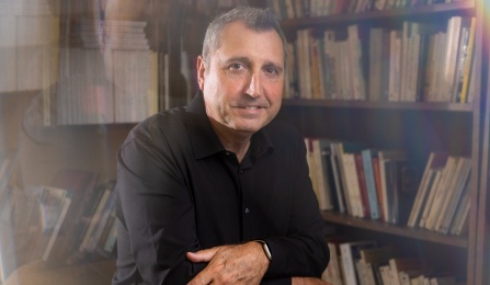 A portrait of David Castillo, with the department of romance languages and literatures, taken in August 2023 in Clemens Hall. Photographer: Douglas Levere. 