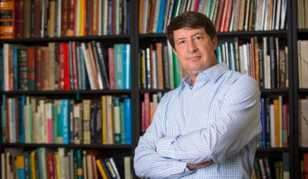 A portrait of professor Doug Perrelli, of Anthropology, in the Ellicott Complex in August 2017. Photographer: Meredith Forrest Kulwicki. 