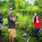 Ivan Parmuzin, Travis Nelson, Kristin Wolfram (Williamsville SD), Heather Thuman (Williamsville SD), and Brian Stuhlmiller (Cuba-Rushford SD), at Bizer Creek, North Campus taking sediment samples. 