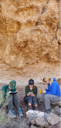 Zoom image: Documenting a super-eruption deposit - Peach Spring Tuff.  Photo by: Greg Valentine. 