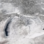 A 2015 satellite image of the Great Lakes, which are almost completely covered in ice. 