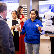 SUNY Chancellor John B. King Jr., Eunice Lewin, a member of the board of trustees of SUNY, and Rep. Joe Morelle meet with students to hear about different research initiatives at UB&rsquo;s National AI Institute for Exceptional Education. 