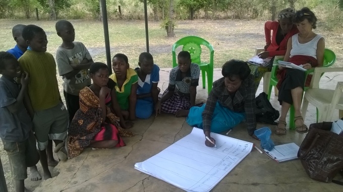 Pamela working with a community in Africa. 