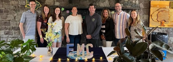 Sandra poses with a group of local officials from Erie County. 