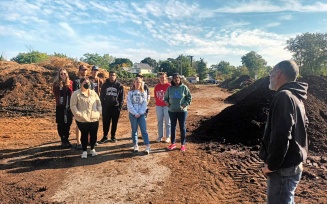 Zoom image: EVS 311 Sustainability Methods students visited Farmer Pirates to learn about food composting methods and operations of Farmer Pirates. 