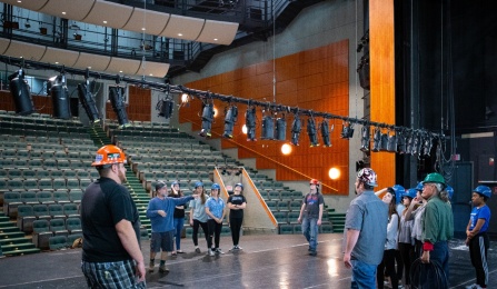 Zoom image: Students work with Jonathan Shimon, professor in the Department of Theatre and Dance, in the Drama Theatre at the Center for the Arts. 