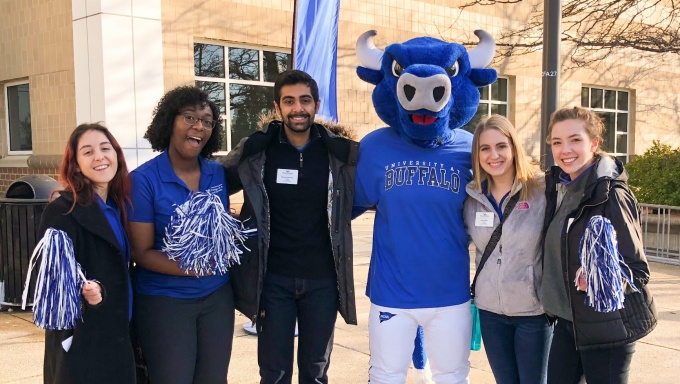 College Ambassadors with Victor E. Bull at an admissions event. 