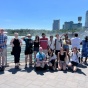 A group of students pose for a photo at Niagara Falls. 