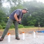 Student setting up experiment at the field station. 