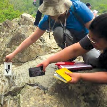 Students examining rocks. 