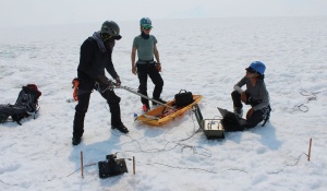 Professor Erasmus Oware, Diana Castro, and Professor Kristin Poinar at Taku Glacier, Juneau Icefield, Alaska. 