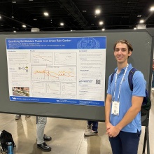 Zoom image: Jason Hanania next to his prize-winning poster at the Hydrology Division of the Geological Society of America (October 9 – 12, Denver, Colorado).   