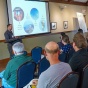 Jason Briner addresses climate scientists from around the world during the NSF workshop "How Stable is the Greenland Ice Sheet?". 